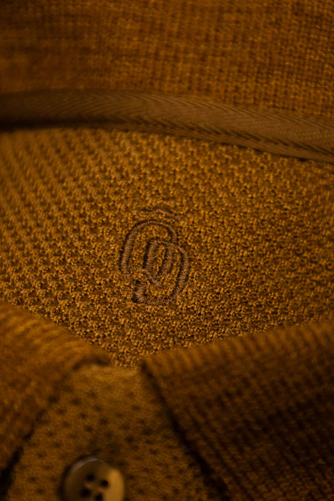 Men's polo shirt crafted from Italian structured "honeycomb" Brown