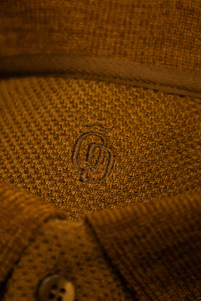 Men's polo shirt crafted from Italian structured "honeycomb" Brown