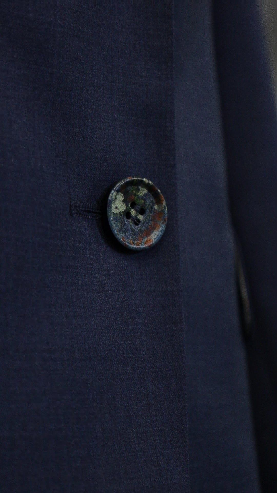 Blue four-piece suit made of wool with a silk lining.